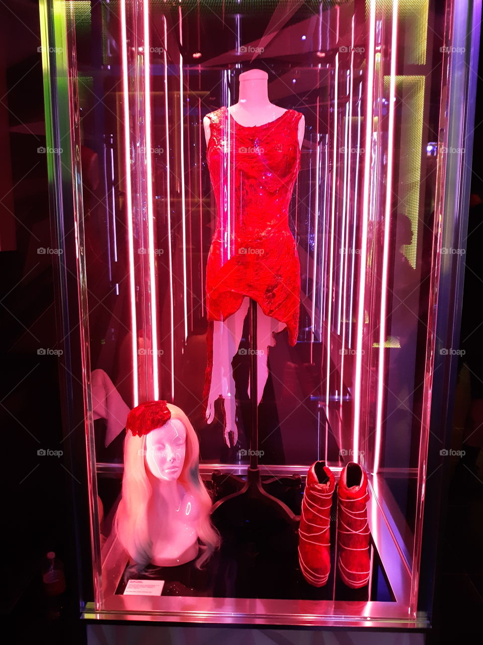 Lady Gaga's beautiful red dress with matching boots and headpiece.