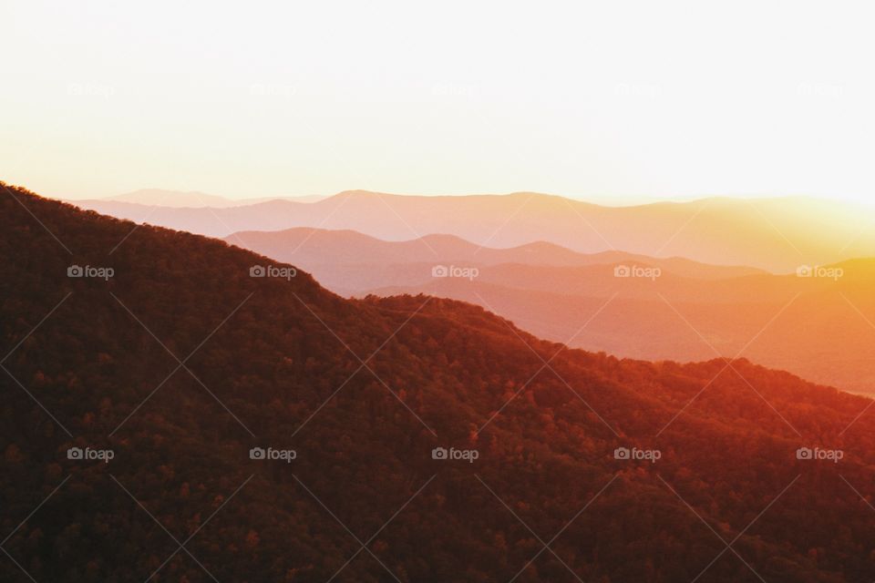 View of sunlight and mountain range