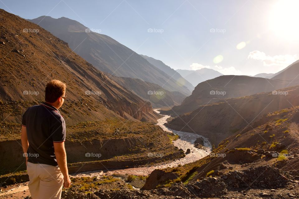 Man admiring horizon at Argentinian Andes