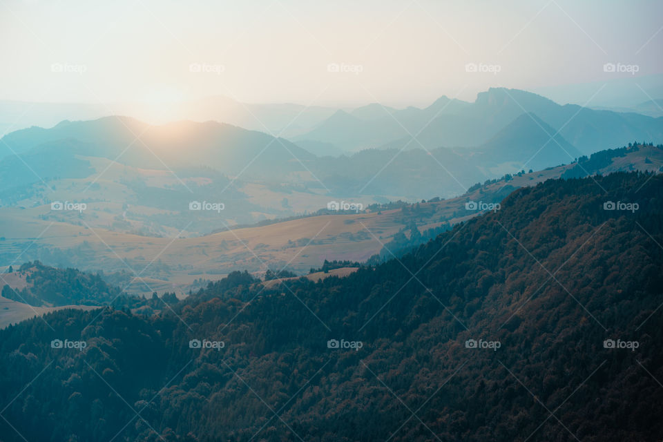 Mountain river valley landscape. Beautiful natural scenery before sunset. Dunajec river at the foot of Trzy Korony (Three Crowns) peak in the Pieniny Mountains