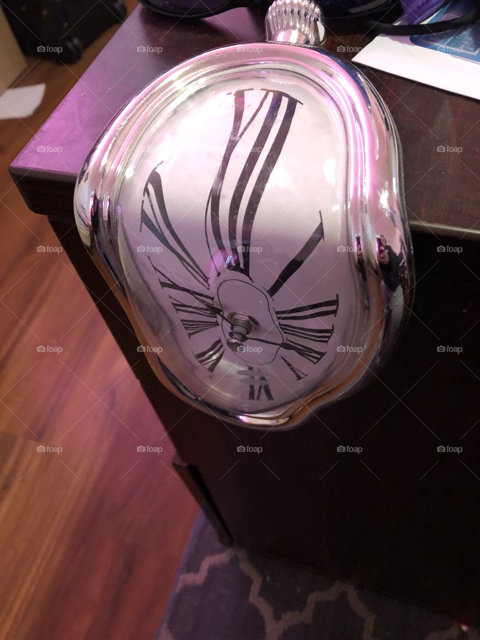 Surreal Salvador Dali clock.