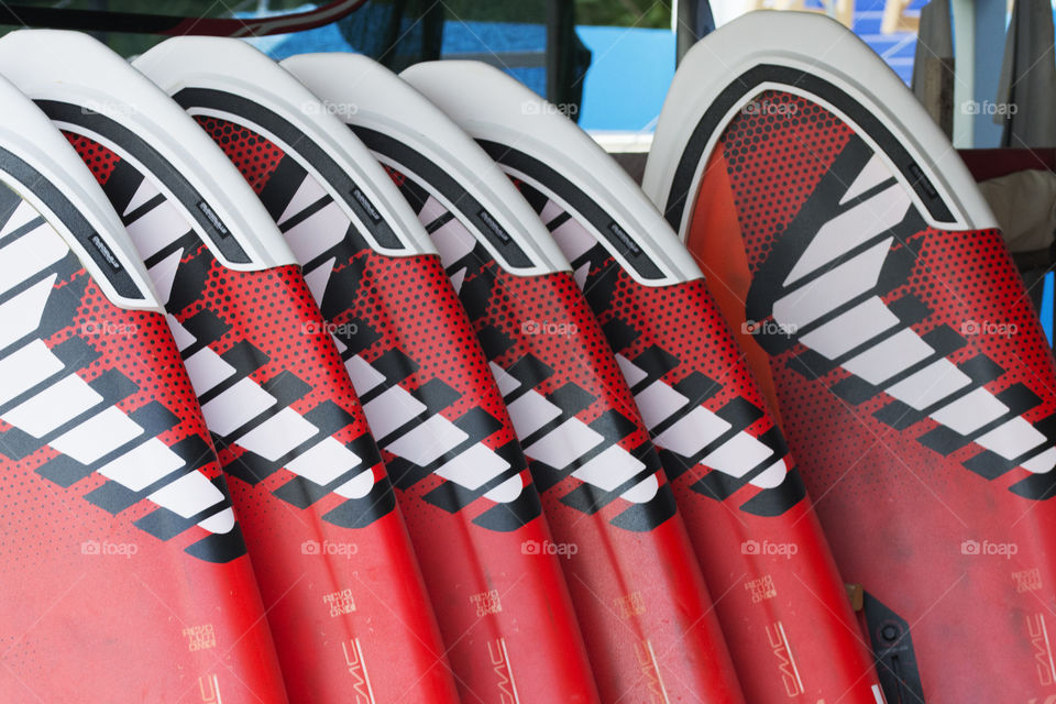 Many windsurfing boards waiting to be launched