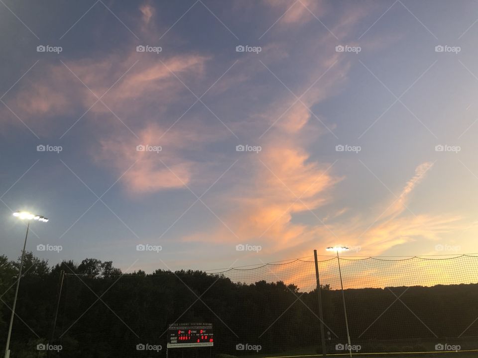 A beautiful night sky enjoying some baseball