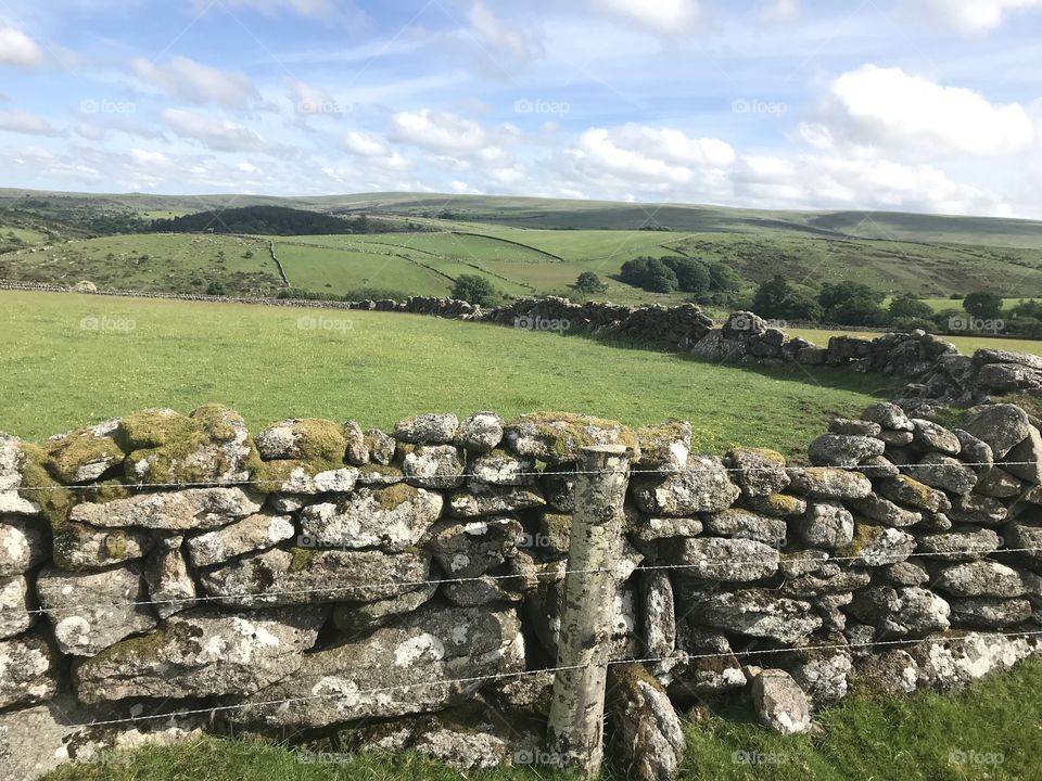 Rolling beautiful hills and a wall built with hard toil by hand to last forever, another piece of Dartmoor magic.