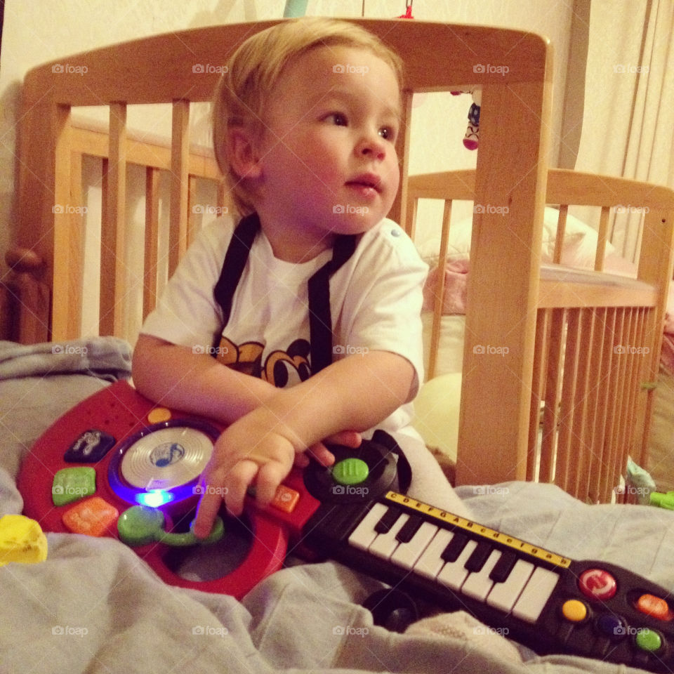 little boy with an electric guitar