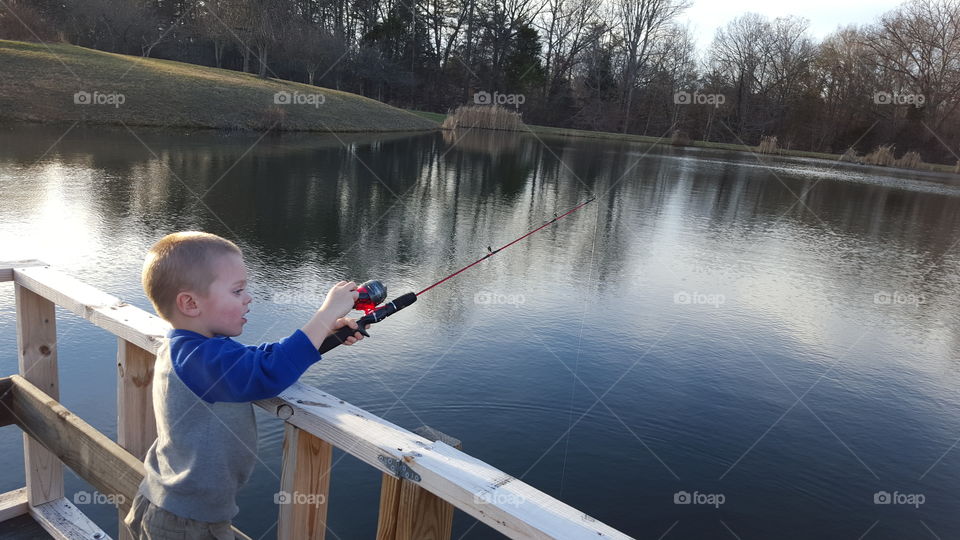 little boy fishing