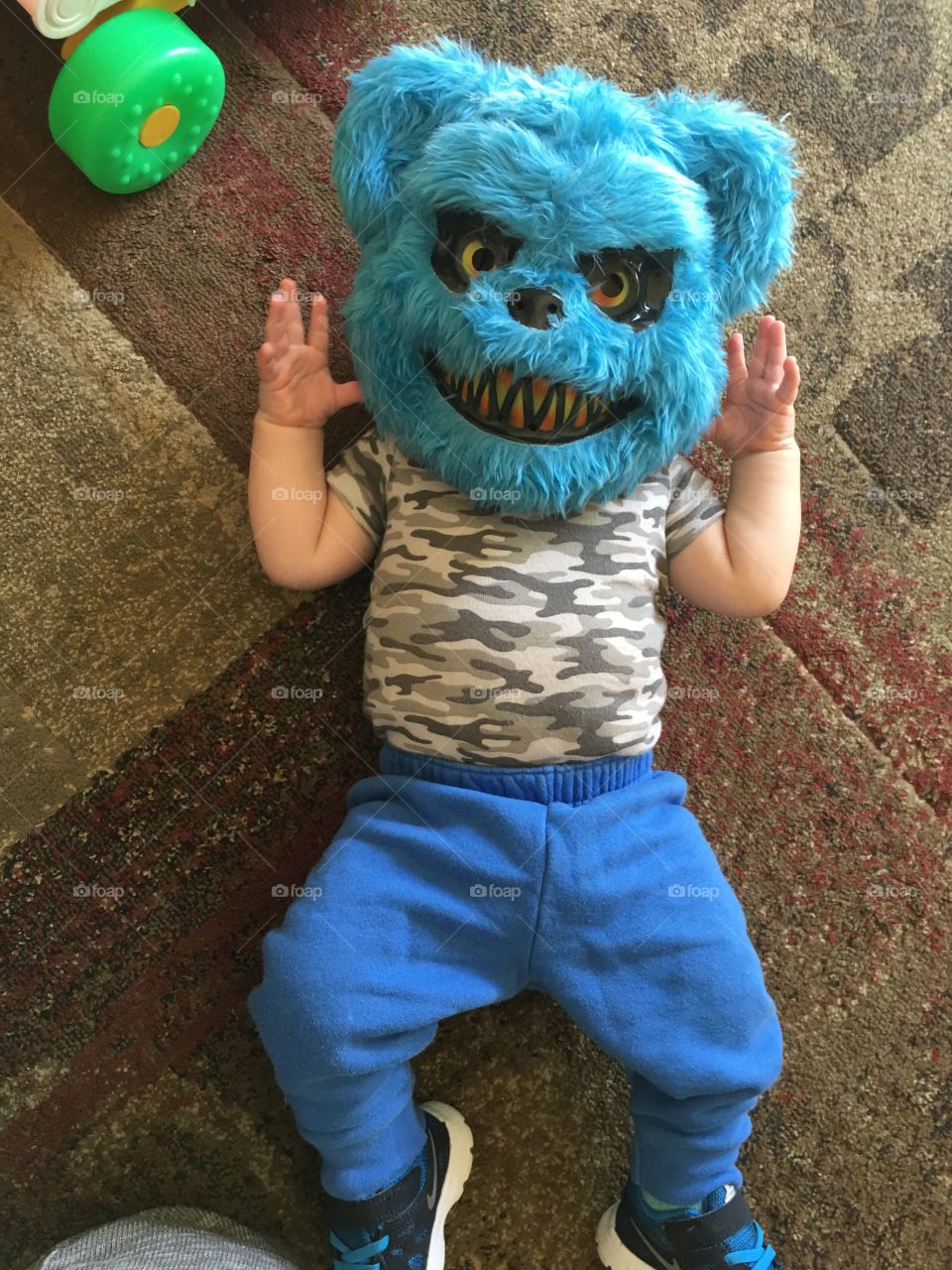 My son with a scary mask on for Halloween. This wasn’t his costume he just really loved the mask. 