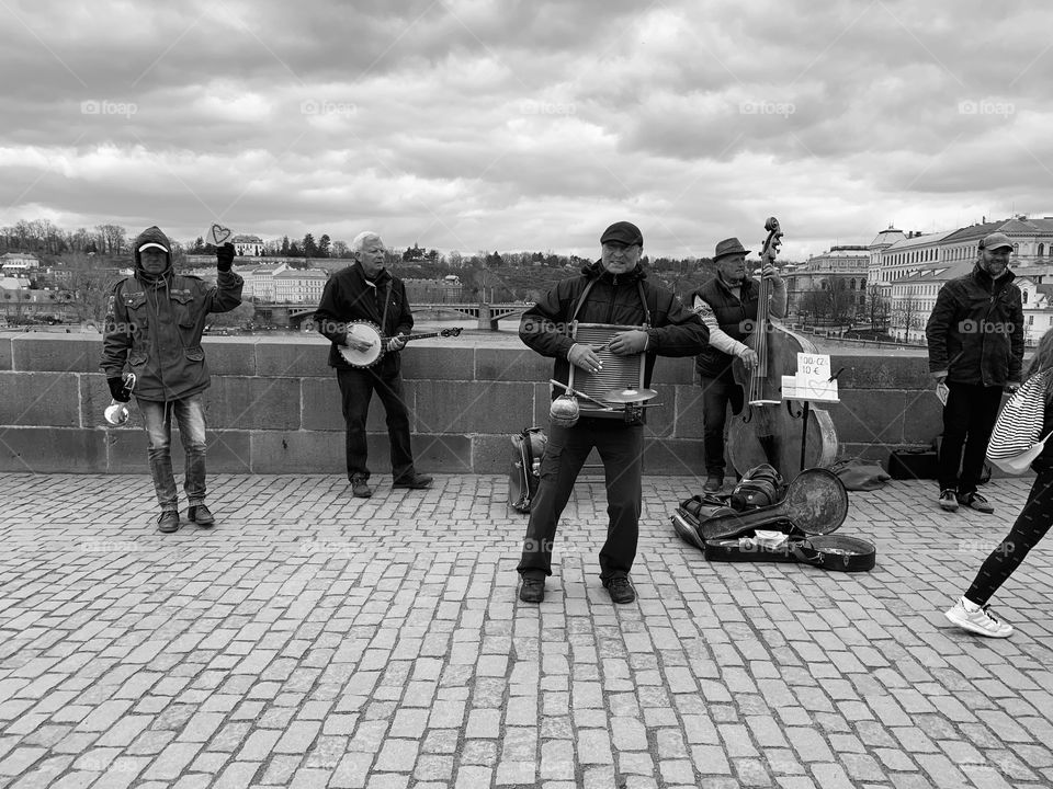 A old band playing on Charles Bridge in Prague. 