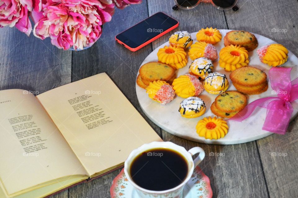 Coffee break with cookies and book 