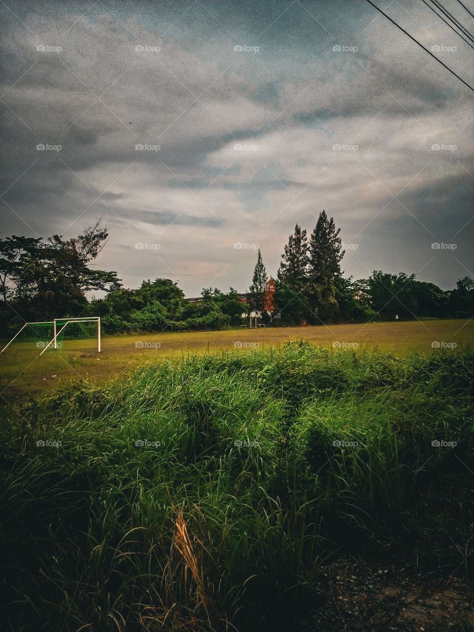 View of a football field on a cloudy day