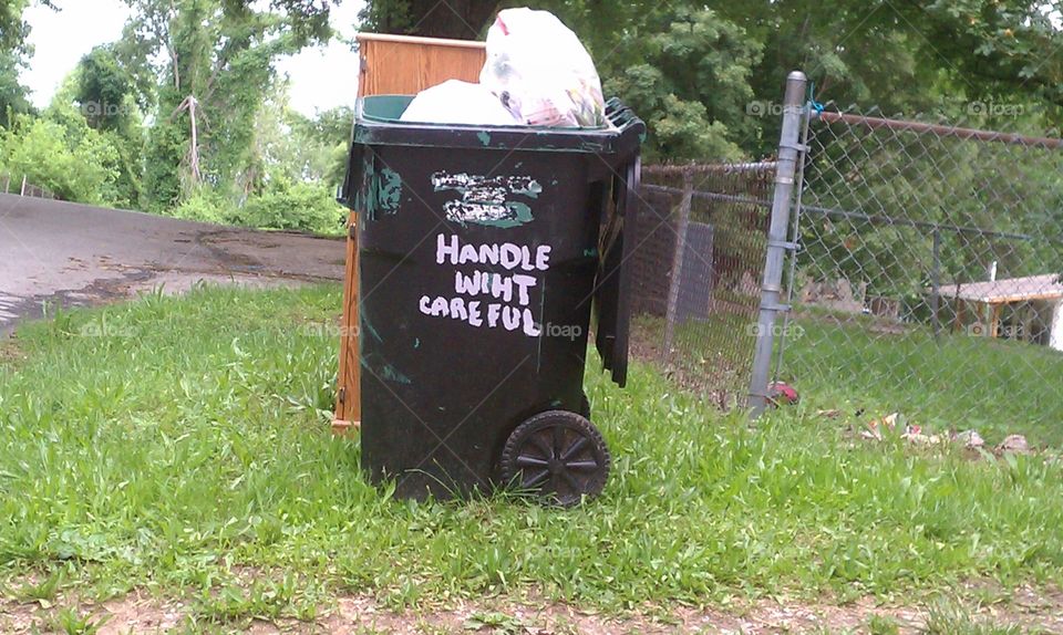 trash can, "handle wiht careful"
Independence,  Missouri