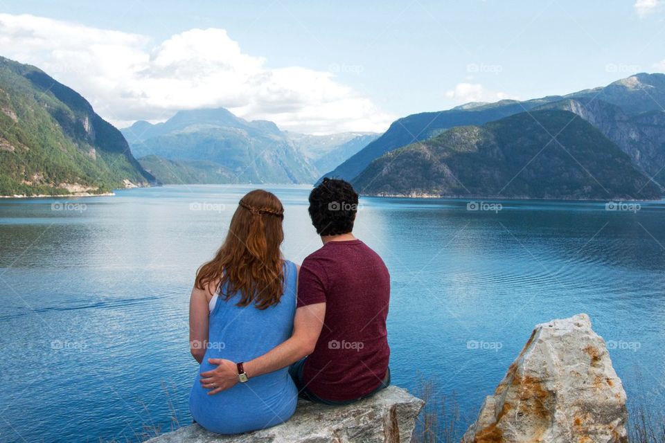 Rear view of a couple looking at view