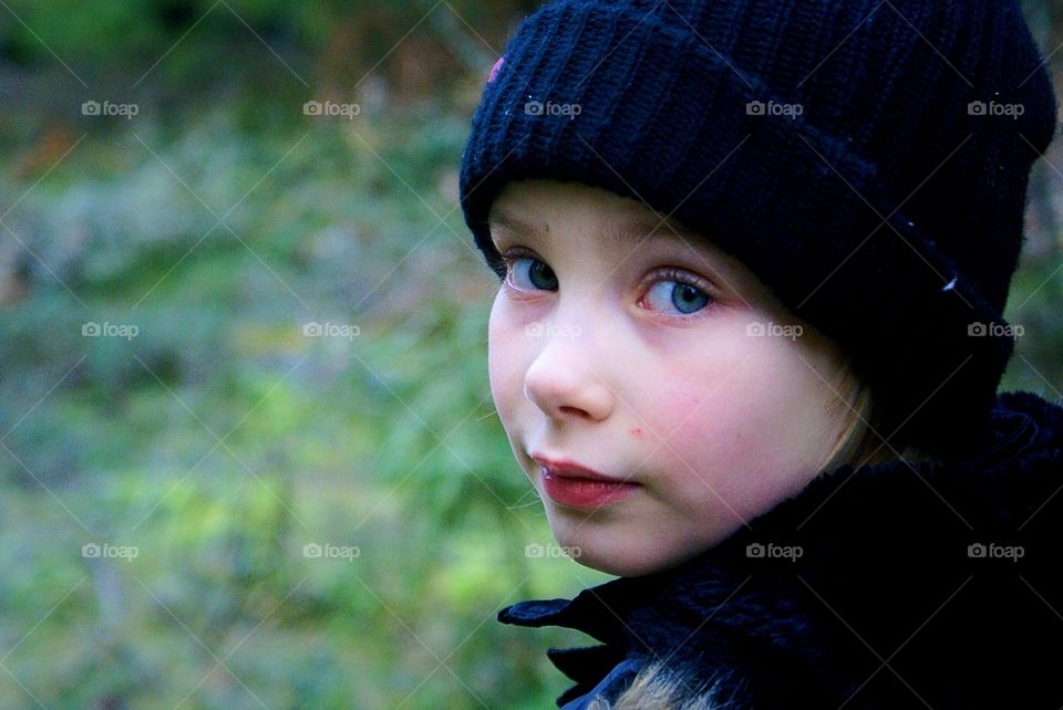 Girl looking over her shoulder