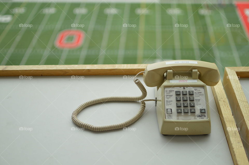 Phone and football field