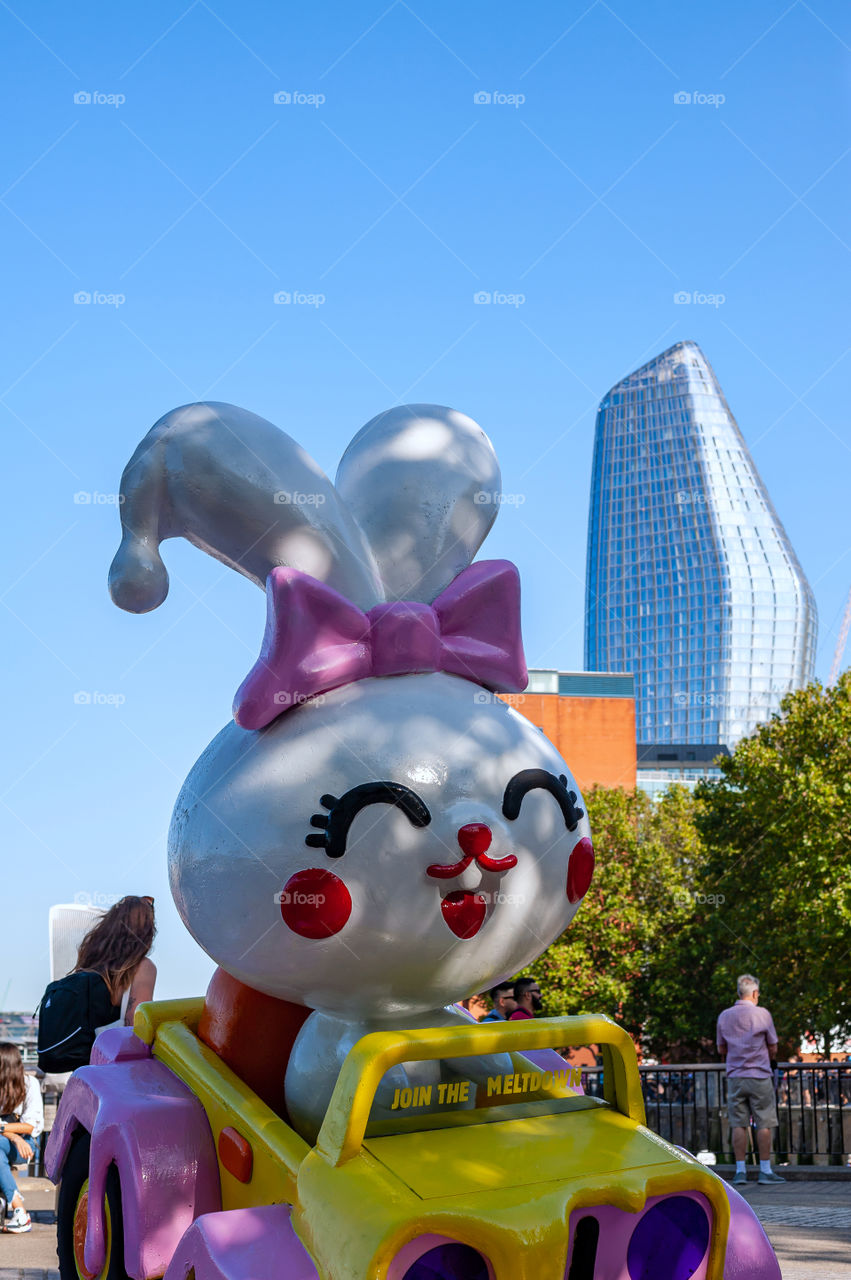 Giant rabbit toy in Queens Walk. London. UK.