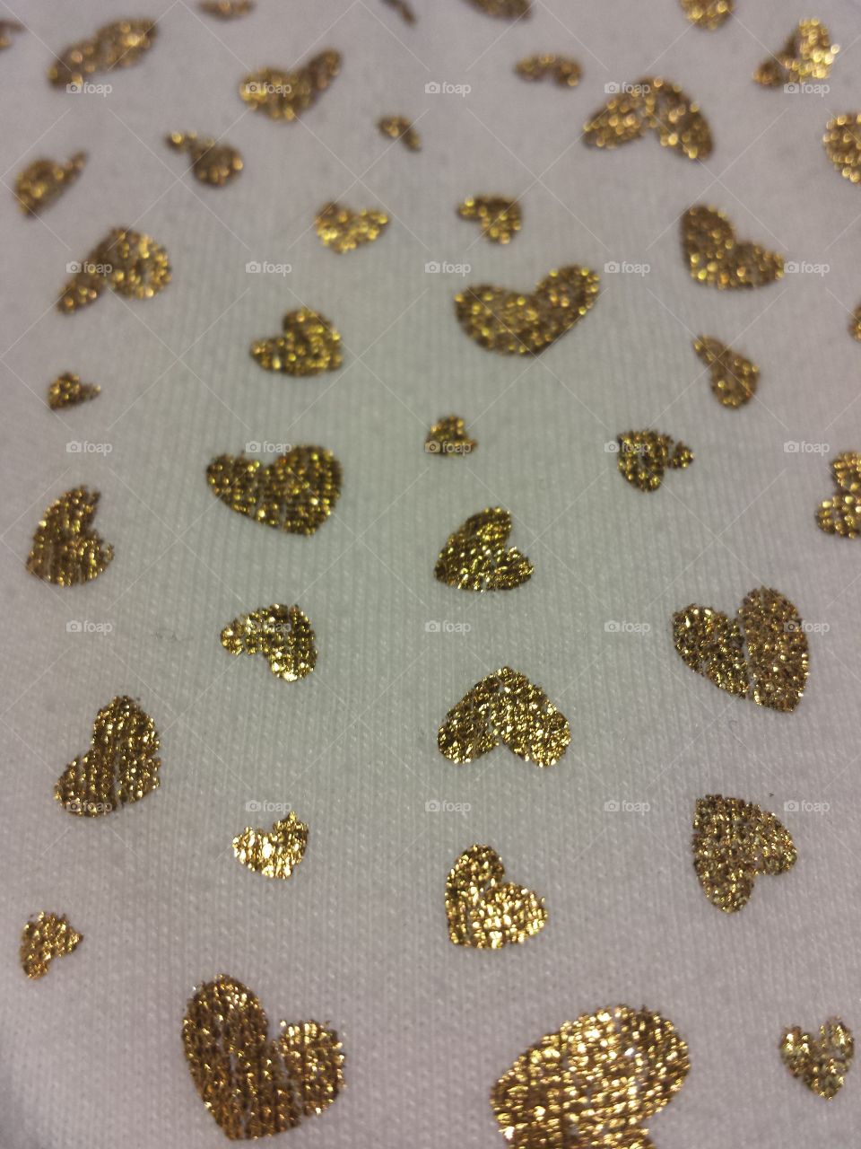 Gold Hearts on White Fabric