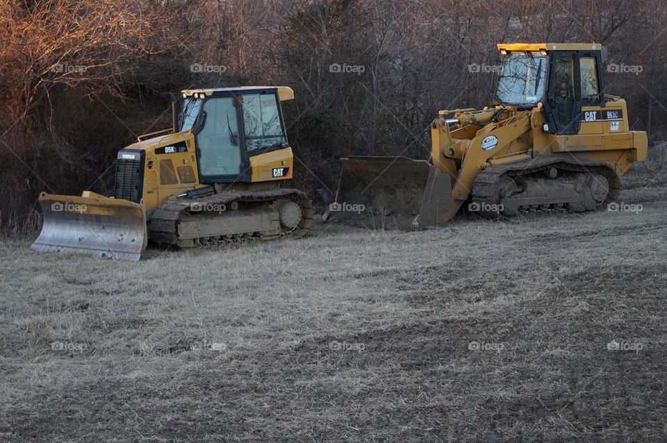 Yellow construction trucks