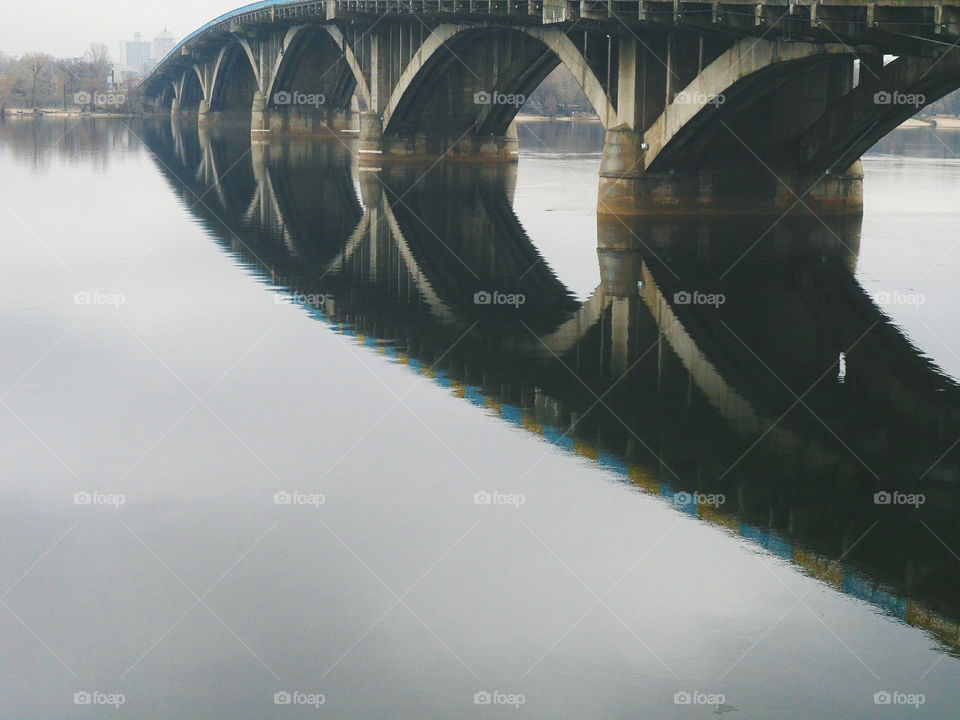 reflection of the bridge on the Dnieper river,Kiev