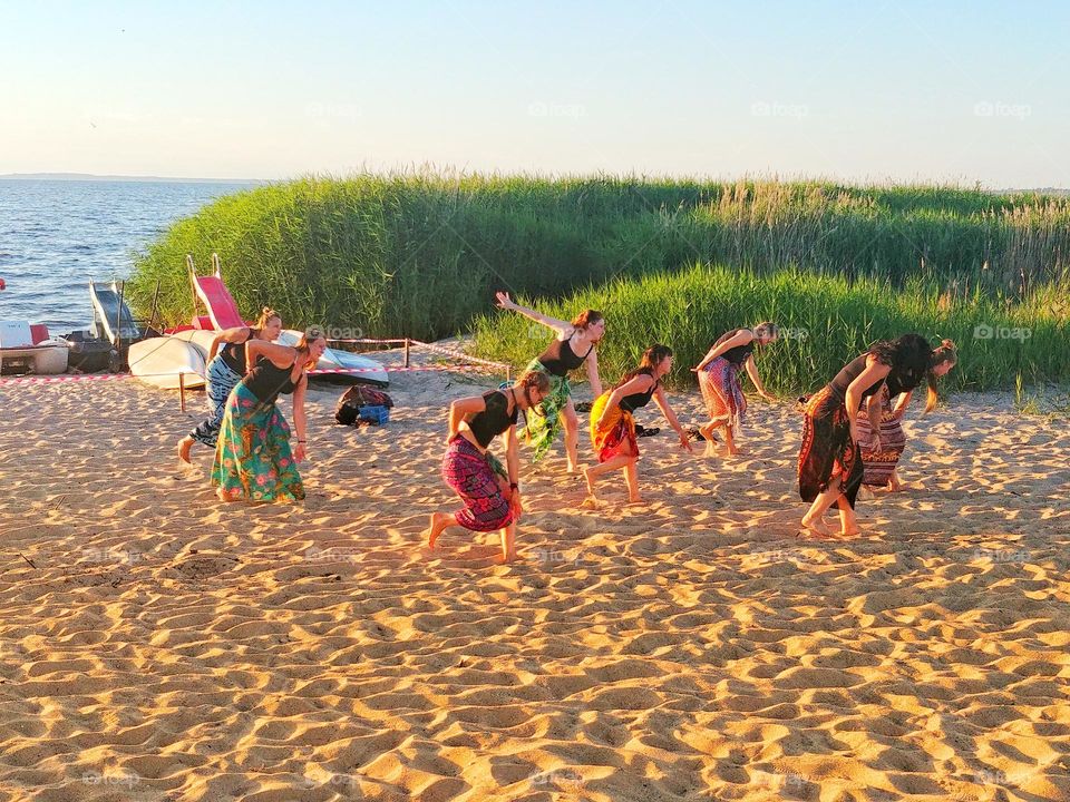 Beach with dancing girls