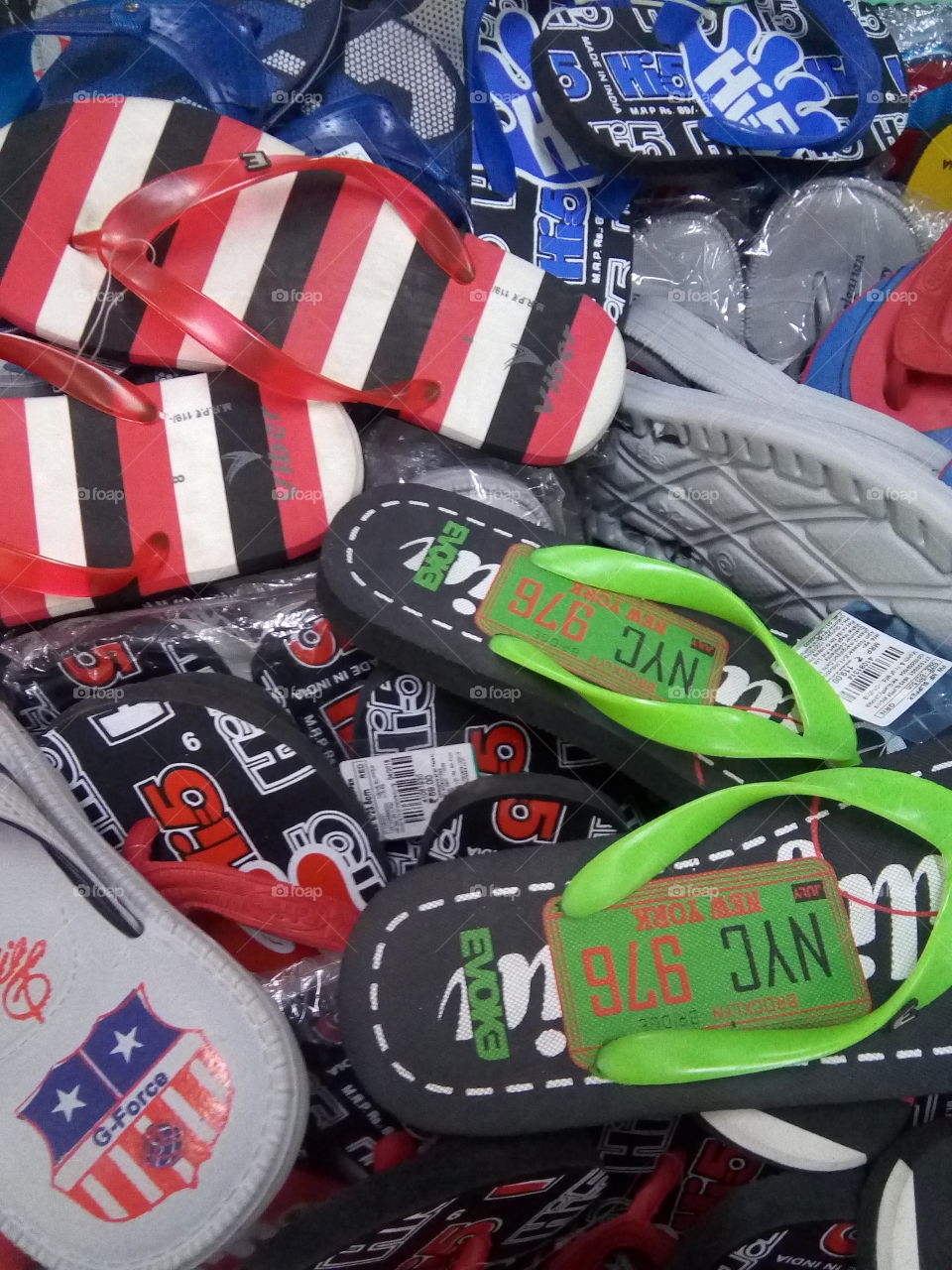 a heap of different kinds of slippers