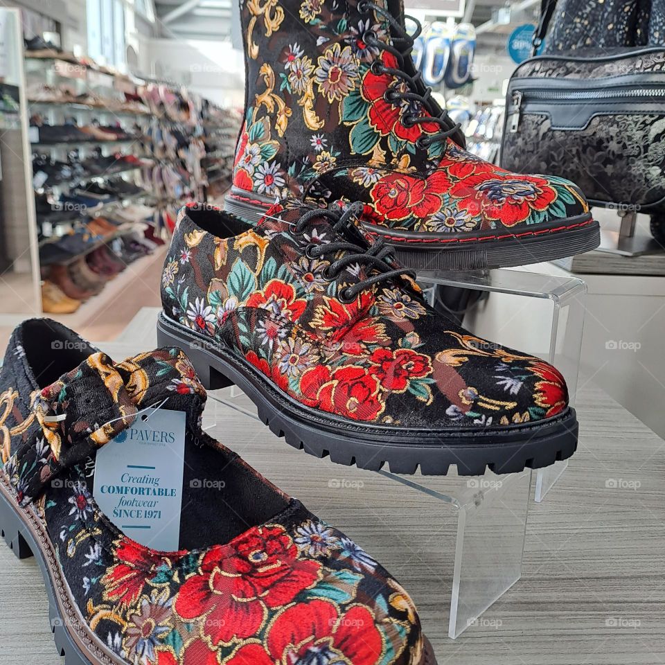 floral courful boots for sale on shop shelves