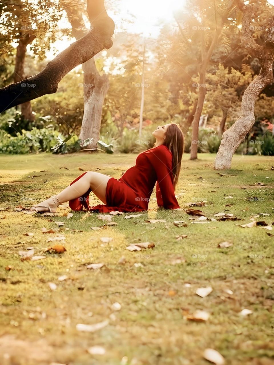 Pregnant woman feeling peaceful amidst nature