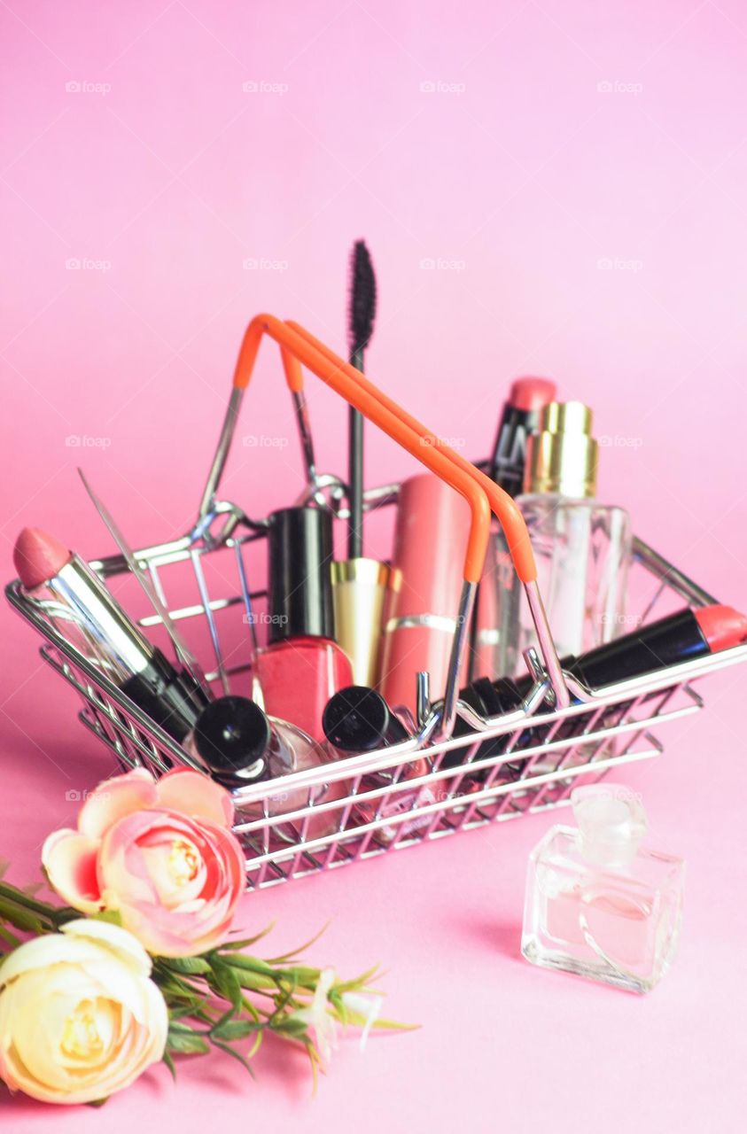 decorative cosmetics in a basket