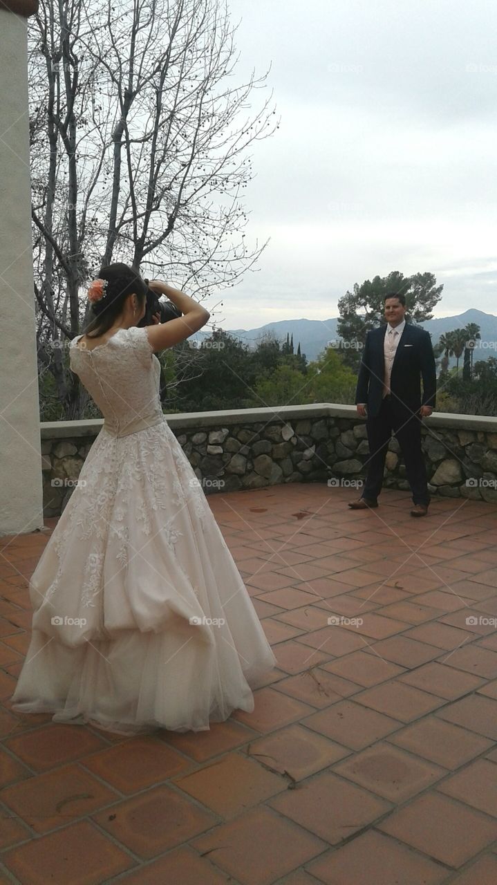 Bride photographing Groom