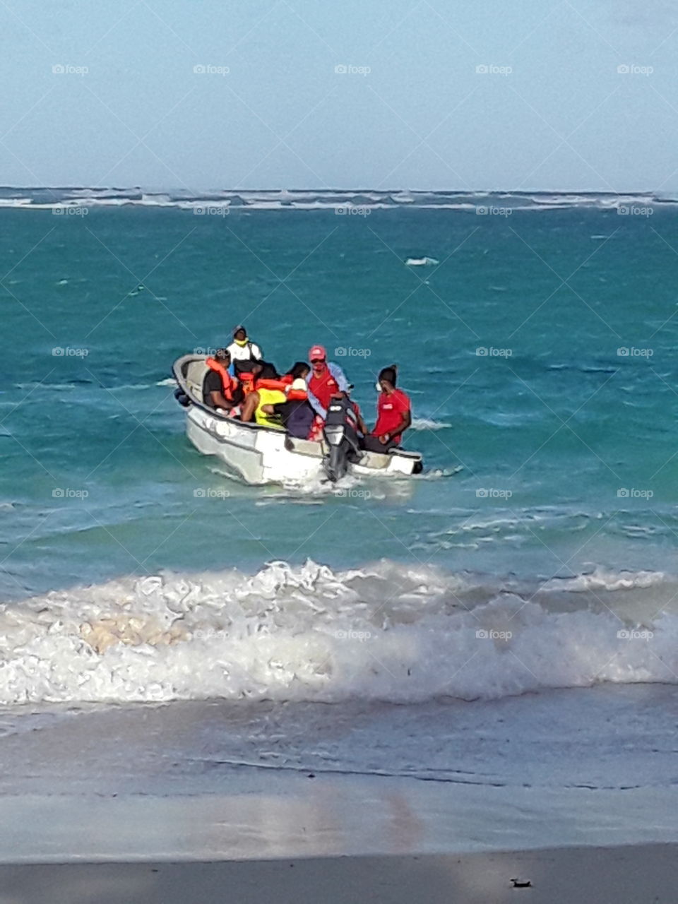 people in the boat dock to the shore