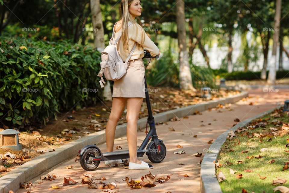 Woman riding on scooter 