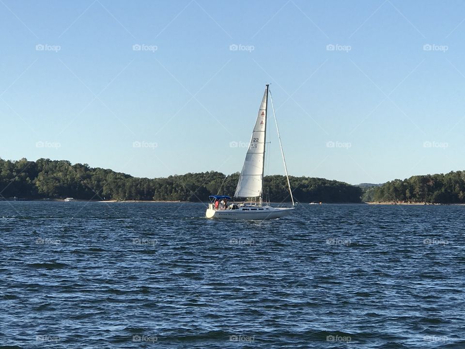 Sail boat on lake