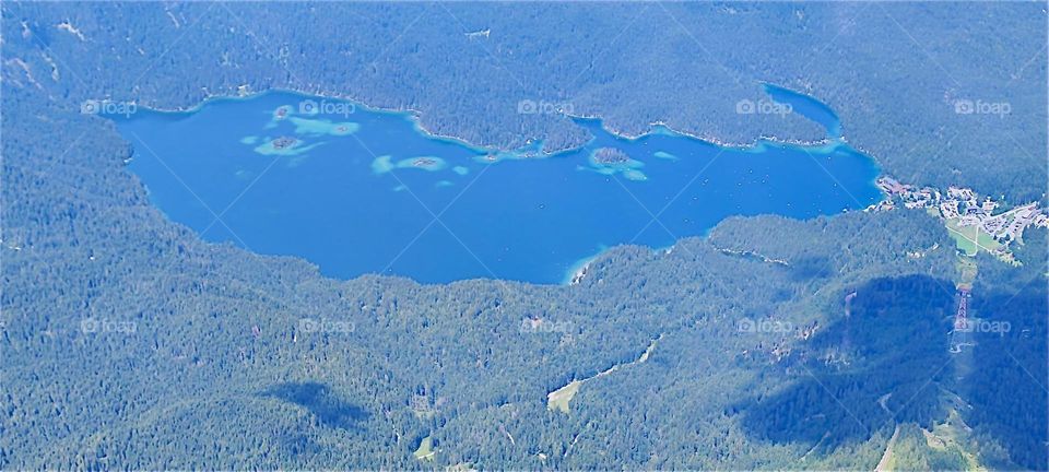 Down below in the valley is “Lake Eibsee” by “Garmisch-Partenkirchen” in the Bavarian Alps. We are taking the “Seilbahn Zugspitze” aerial tramway to below the 2962 m summit of Germany’s tallest mountain. How exciting !!! 2024. Hypnotic Productions