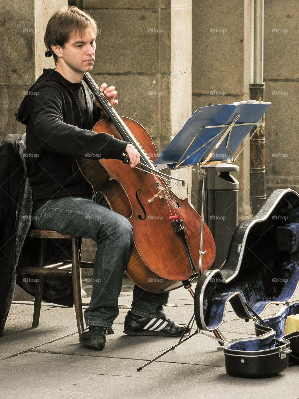 Street musician playing cello