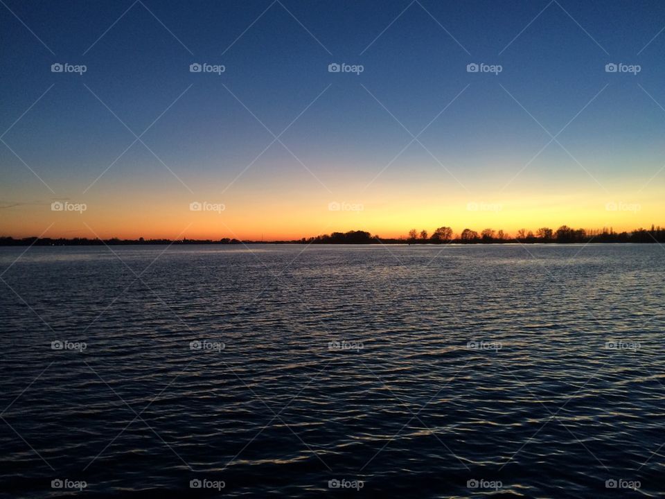 Scenic view of sea during sunset