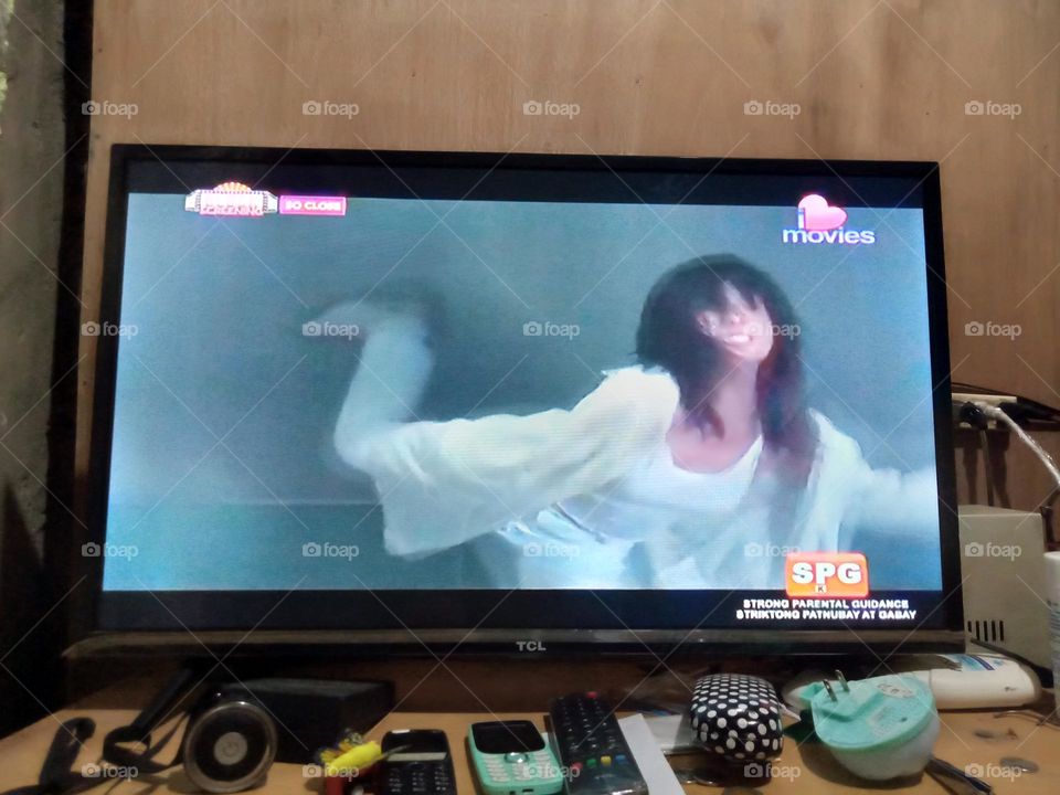 THE LEADING LADY IS KICKING AGAINST THE WALL TO START OFF KICKING HER ENEMY,, A SCENE FROM THE MOVIE , SO CLOSE