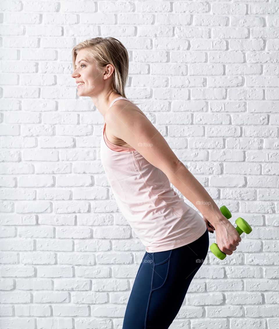 athletic woman working out at home