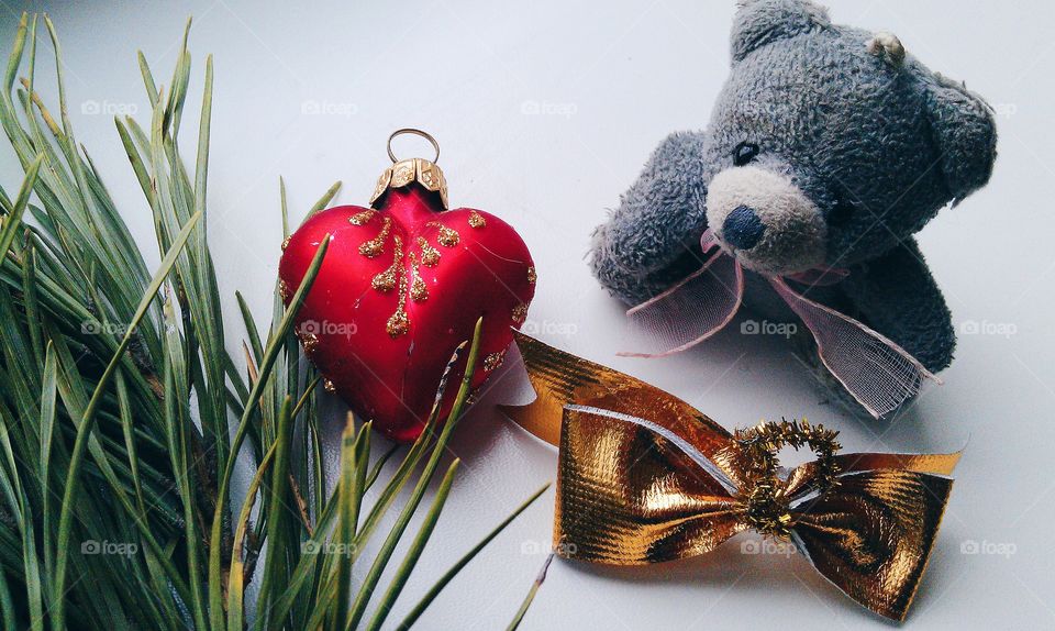 Christmas balls and pine branches on a white background