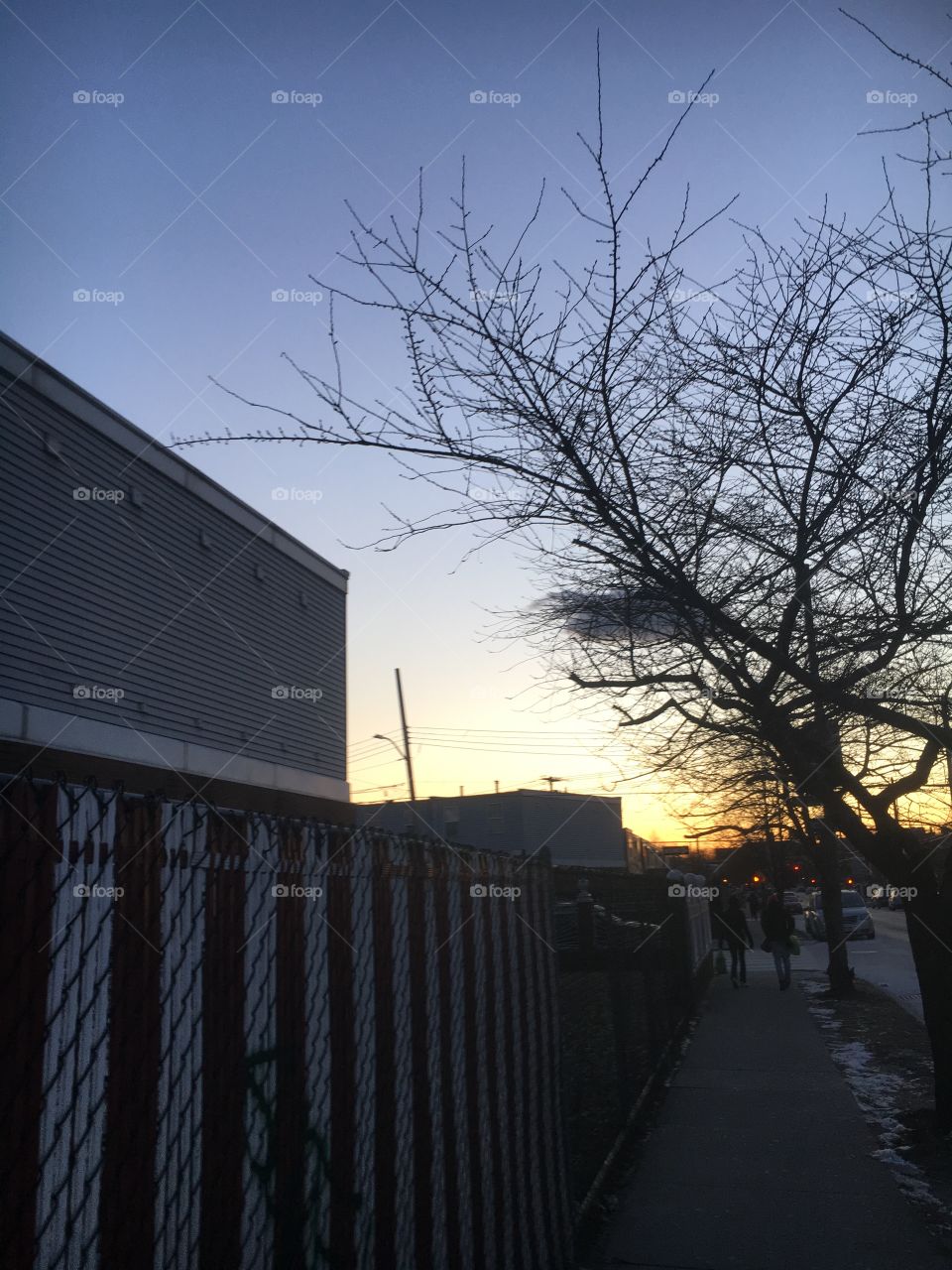 Dark cloud during sunset in winter nyc
