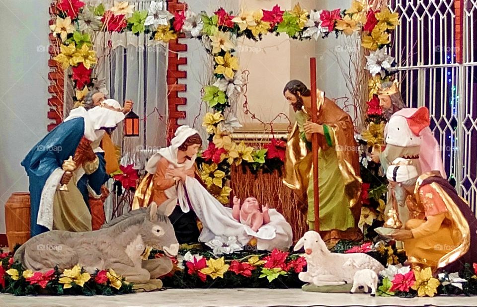 The nativity scene and three kings with their gifts.