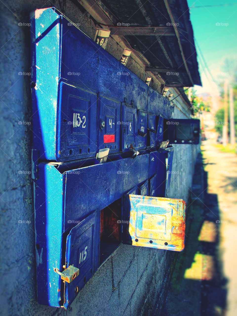 Blue metallic mailboxes