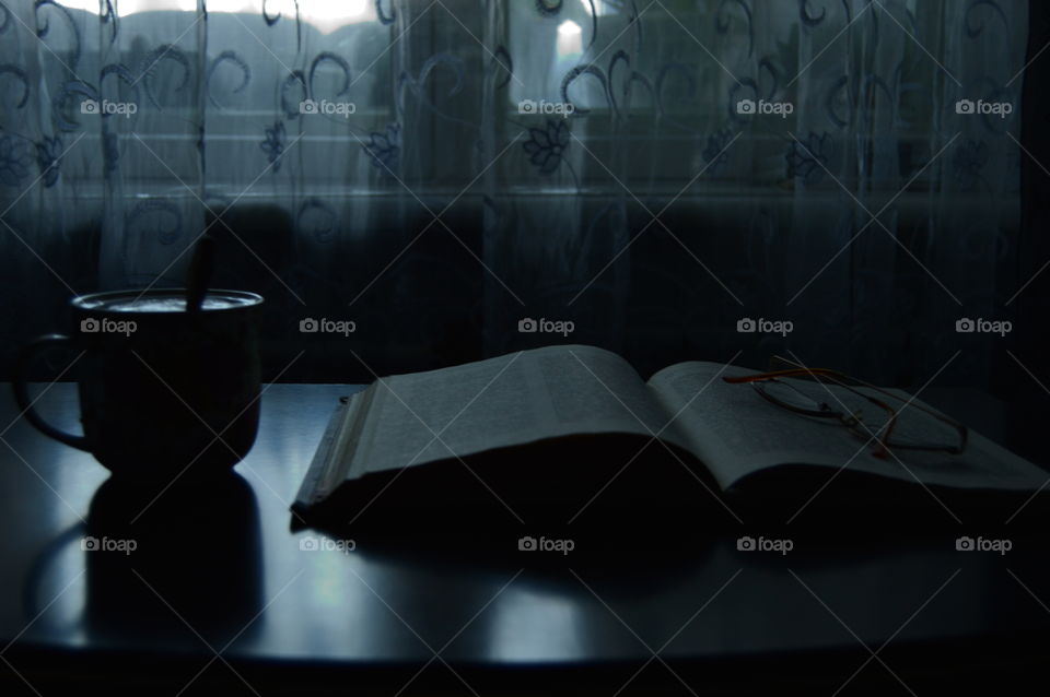 Read the book on a winter evening with a cup of coffee