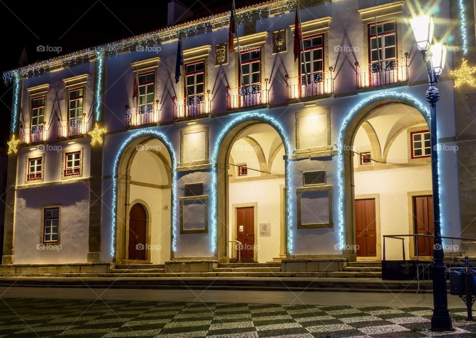 The Town Hall’s windows and entrance decorated with Christmas lights.
