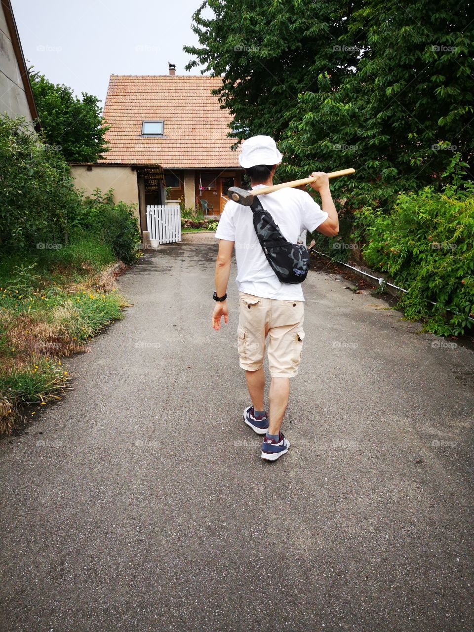 Man walking with a hammer