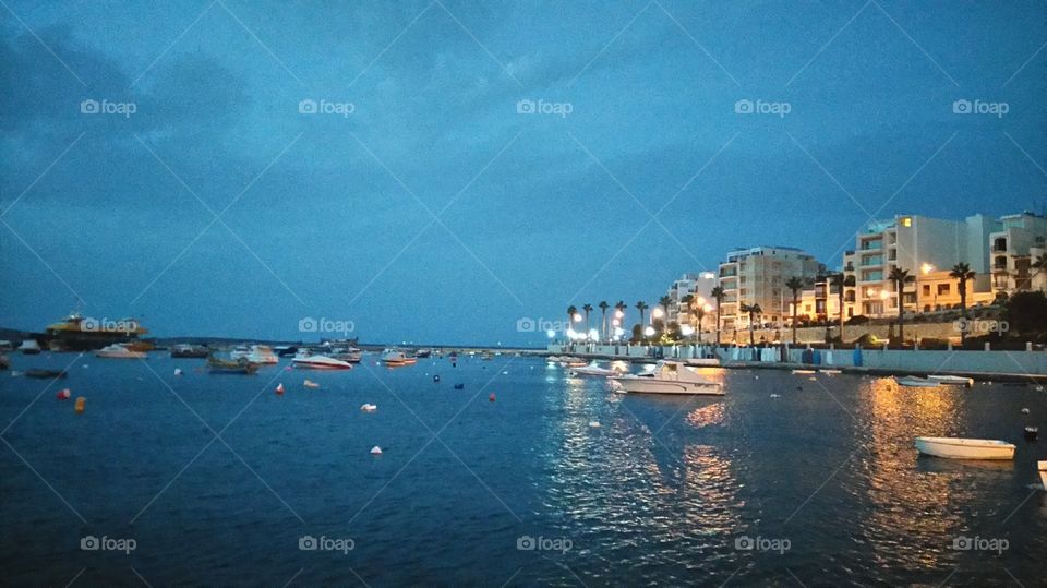 Malta, old town, stone and sea, sunset