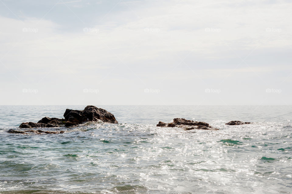 Rocks in sea.