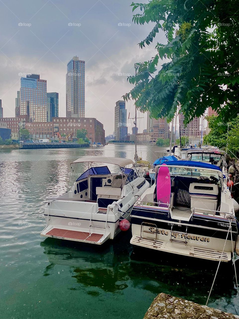 This is “Newtown Creek” by the “Pulaski Bridge” in “Long Island City”, Queens. A variety of picturesque boats are tied to the shore here and lend an idyllic vibe to the area. 2023. Hypnotic Productions