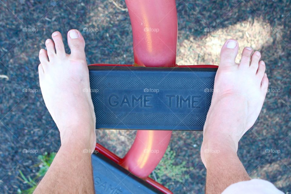 A from where I stand photograph standing on a step with the phrase Game Time on it.