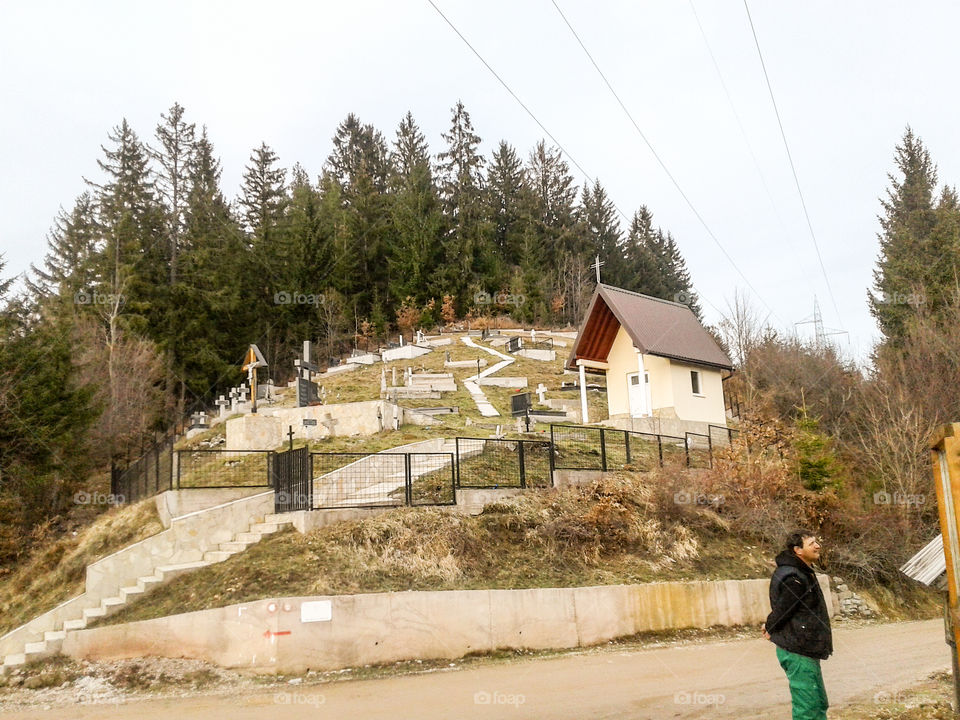 a small graveyard with its capela