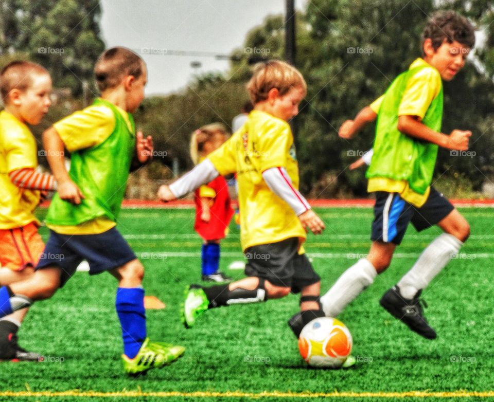 Love Running. Young Soccer Players Running
