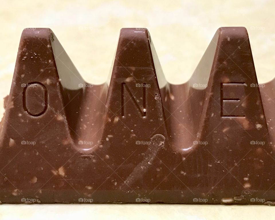Chocolate candy bar with the word one